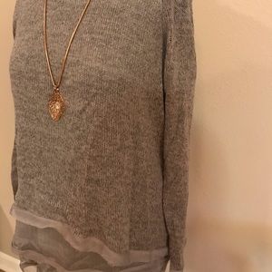 Heather grey layered bottom sweater.